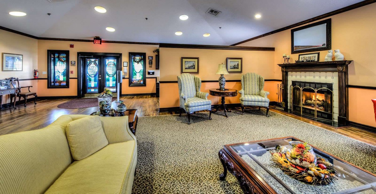 A cozy living room with comfortable seating and elegant decor.