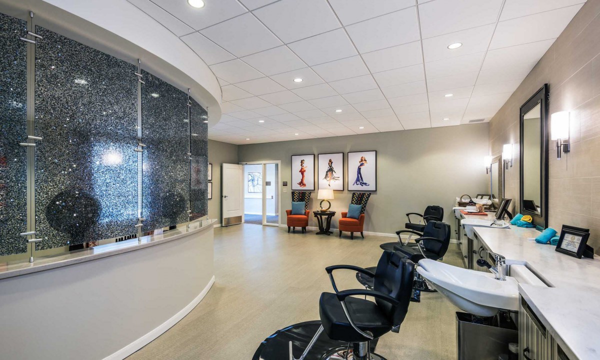 A modern reception area with stylish chairs and artistic decor.
