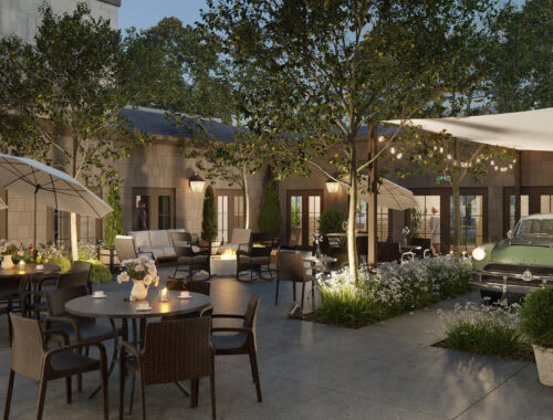 A charming outdoor patio with string lights creates a cozy evening dining atmosphere.