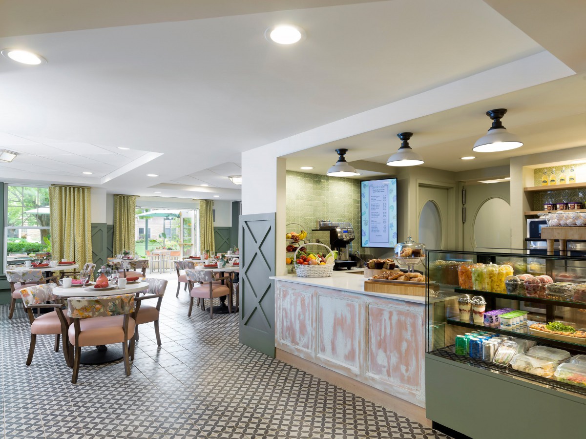 A modern caf interior with stylish furnishings and a cozy atmosphere.