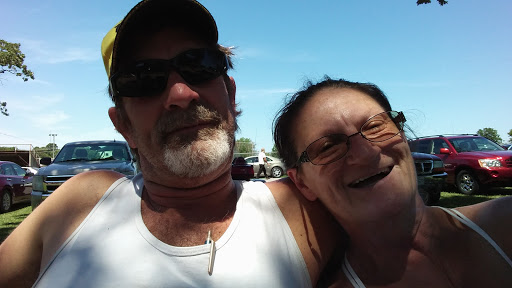 A joyful moment shared between two friends enjoying a sunny day.