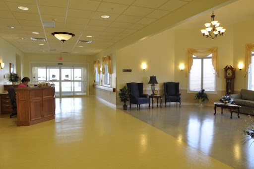 A spacious and welcoming lobby area featuring comfortable seating and bright lighting.