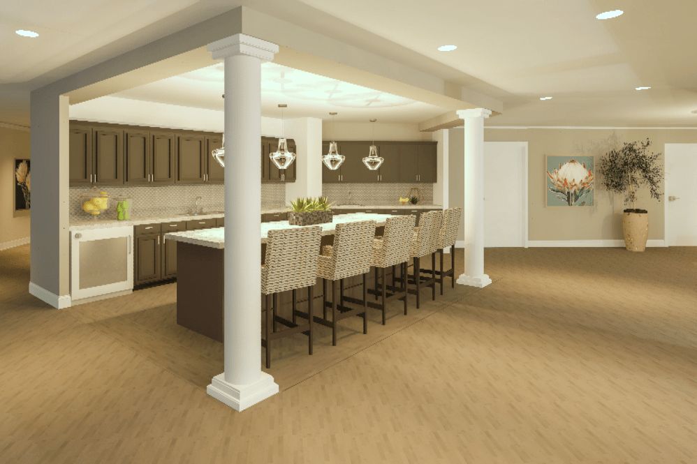 A modern kitchen interior with an island and bar stools, featuring elegant lighting and open space design.