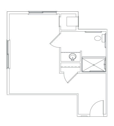 A simple floor plan showing a room layout with a bathroom area.