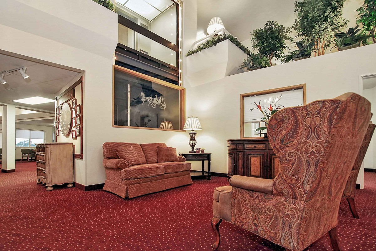 A cozy living room with classic furniture and warm decor.
