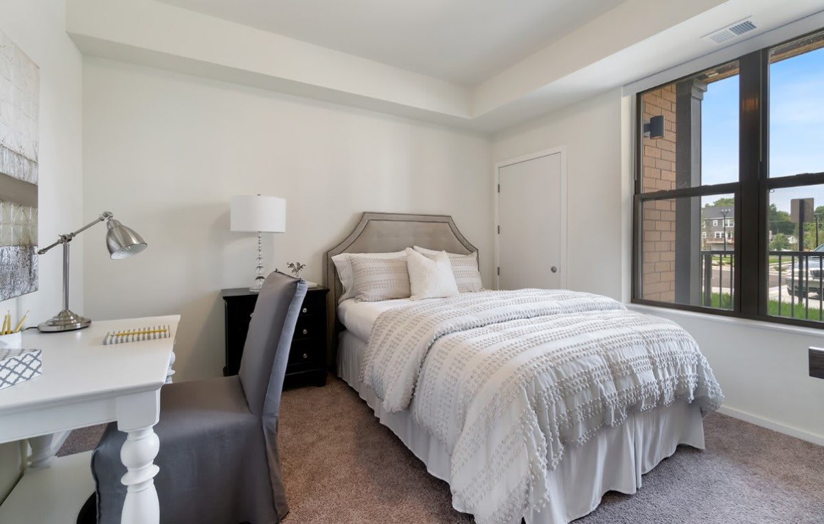 A cozy and well-decorated bedroom with a comfortable bed and stylish furnishings.