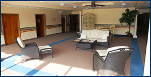 A spacious and inviting living room with comfortable seating, perfect for relaxation and social gatherings.