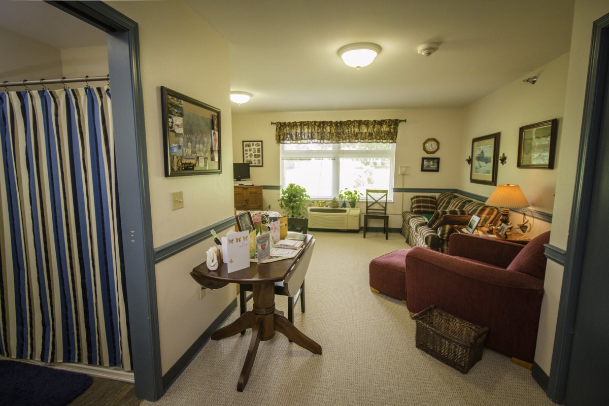 A cozy living room with comfortable seating and natural light.