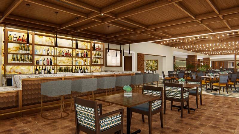 A modern bar and restaurant interior with wooden ceilings and stylish seating.