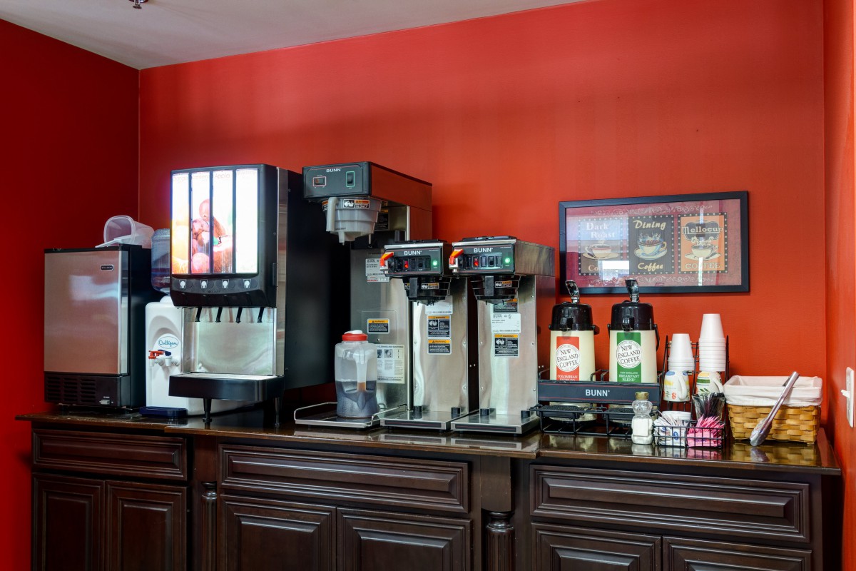 A self-service coffee and beverage station in a caf.