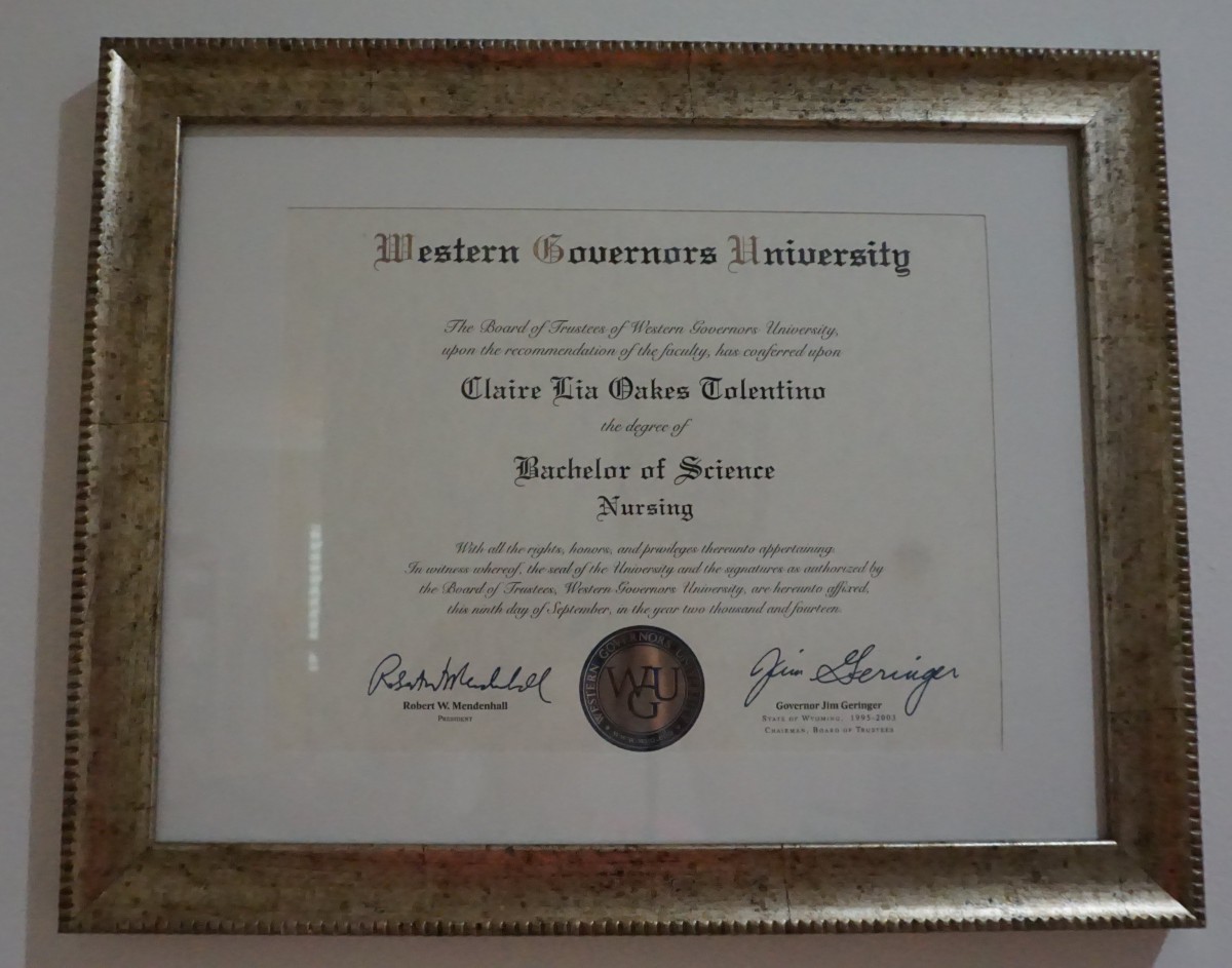 A framed university degree certificate in nursing.