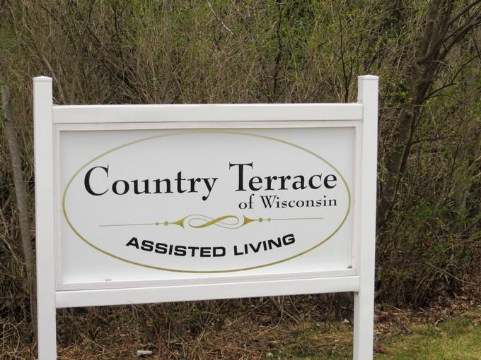A sign for Country Terrace of Wisconsin Assisted Living.