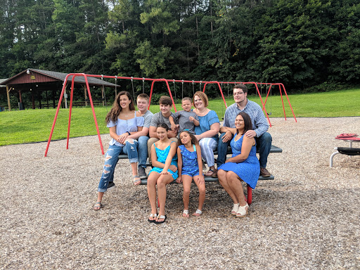 A joyful family gathering at the playground.
