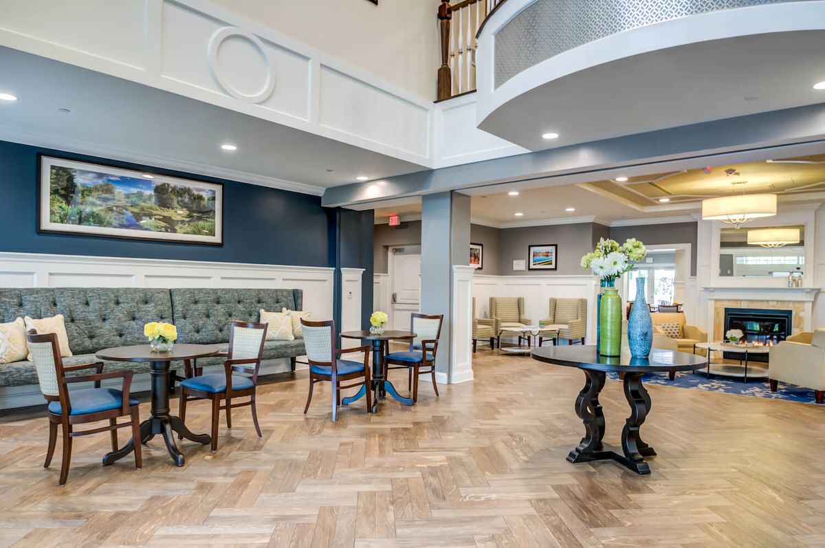 A modern and elegant lobby interior with stylish furniture and decor.