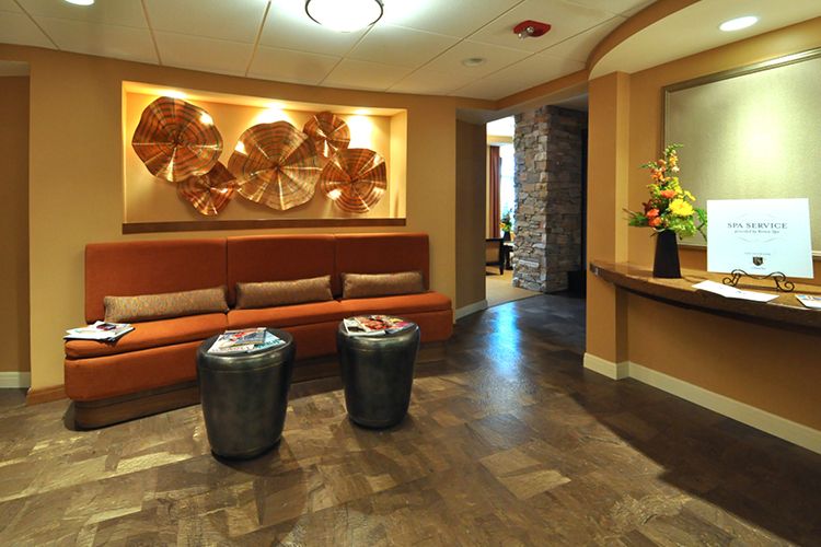 A modern lobby with contemporary artwork and stylish seating.
