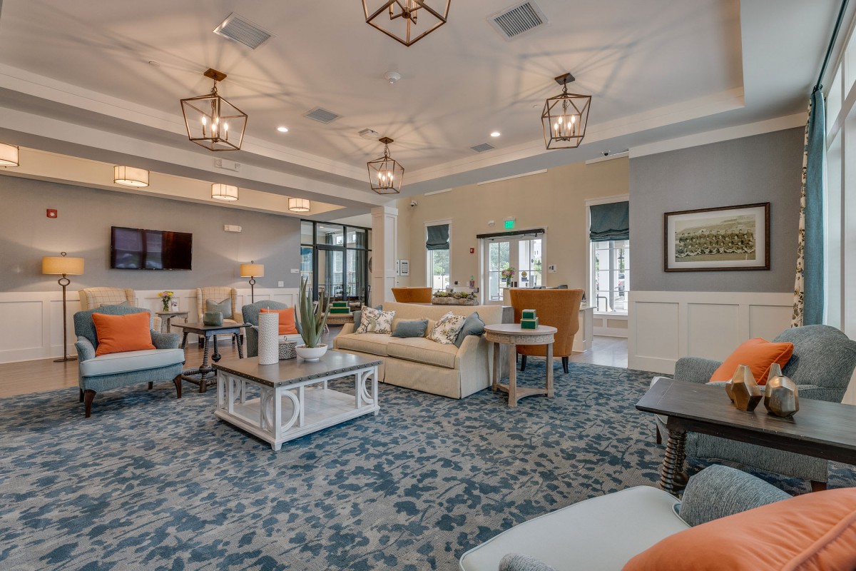 A cozy lobby area with comfortable seating and elegant decor.