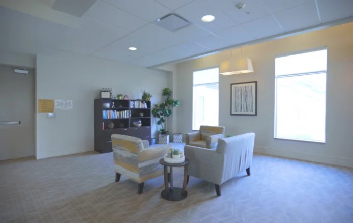 A cozy living room with modern furnishings and a calming atmosphere.