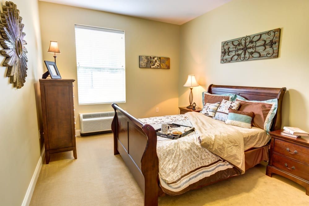 Cozy bedroom with elegant furnishings and soft lighting.
