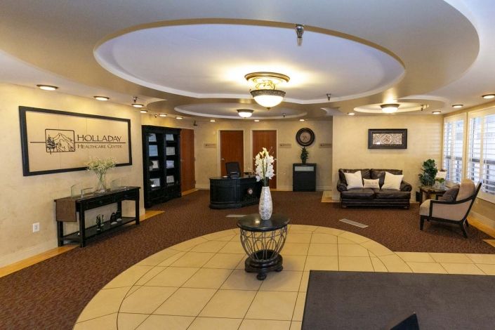 A stylish lobby area with elegant furnishings and soft lighting.