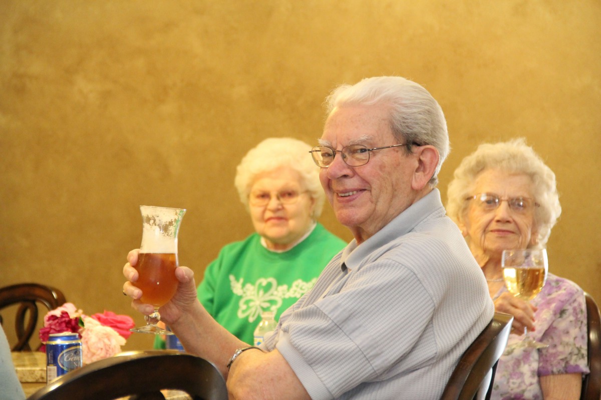 Group of elderly people enjoying a social gathering.