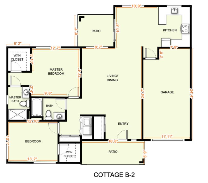 Floor plan of a cottage showing various room layouts and dimensions.