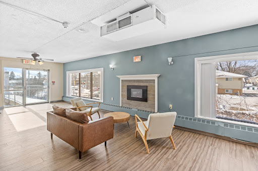 A modern and cozy living room designed for comfort and relaxation.