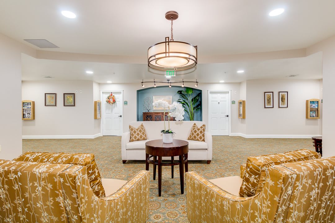 A well-decorated lobby area with comfortable seating and elegant lighting.