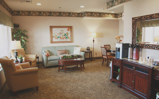 A cozy lobby area featuring comfortable seating and tasteful decor.