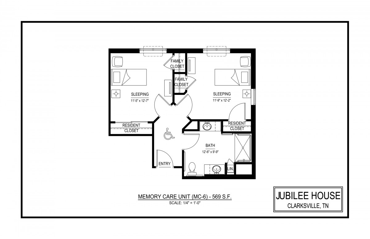 A detailed floor plan of a residential unit with two bedrooms, a living area, and bathrooms.
