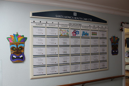 A healthcare facility's scheduling board displaying various activities and events.