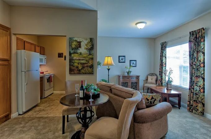 A cozy living room with comfortable seating and tasteful decor.