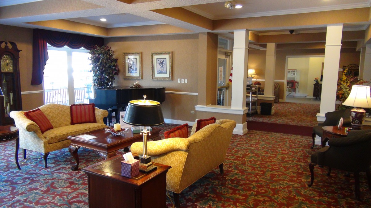 A cozy hotel lobby with comfortable seating and warm lighting.