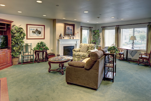 A cozy and inviting living room featuring comfortable furniture and a warm ambiance.