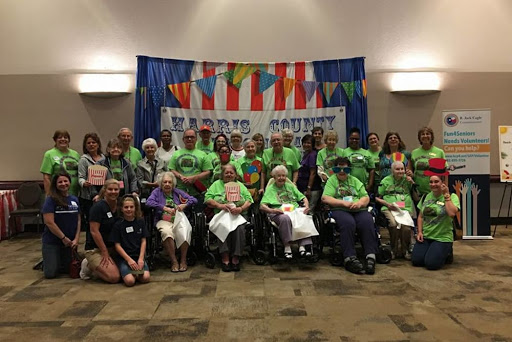 A vibrant group of individuals gathered for a community event, showcasing a sense of unity and joy.