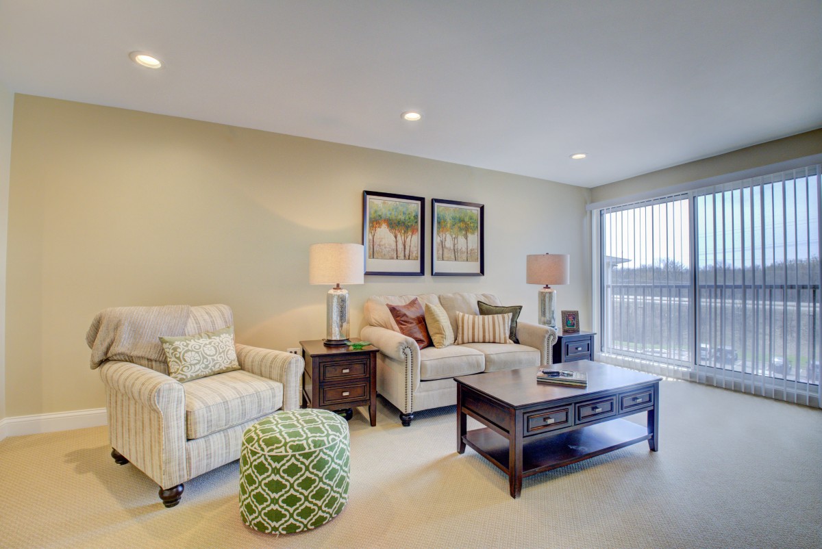 A cozy living room with comfortable seating and stylish decor.