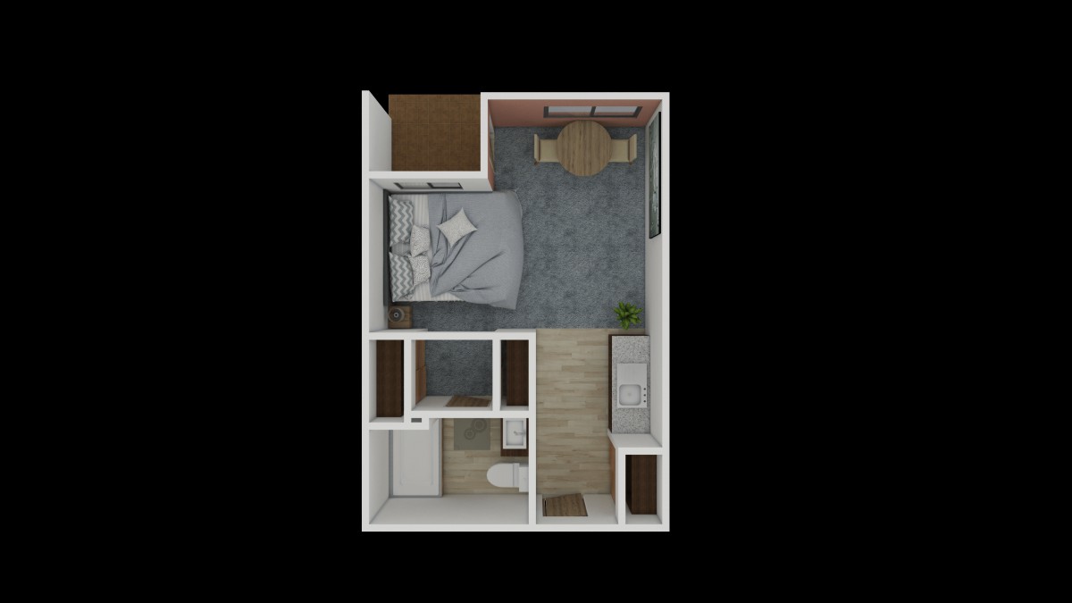 A compact studio apartment floor plan featuring a bedroom area, bathroom, and small living space.