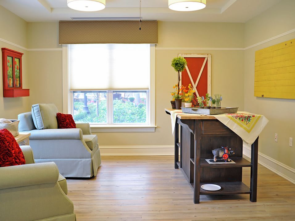 A modern living room with stylish decor and comfortable seating.