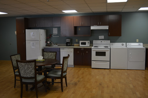 A well-equipped kitchen featuring modern appliances and a cozy dining area.