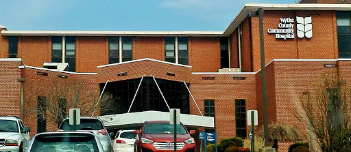 Entrance of a healthcare facility showcasing modern architectural design.