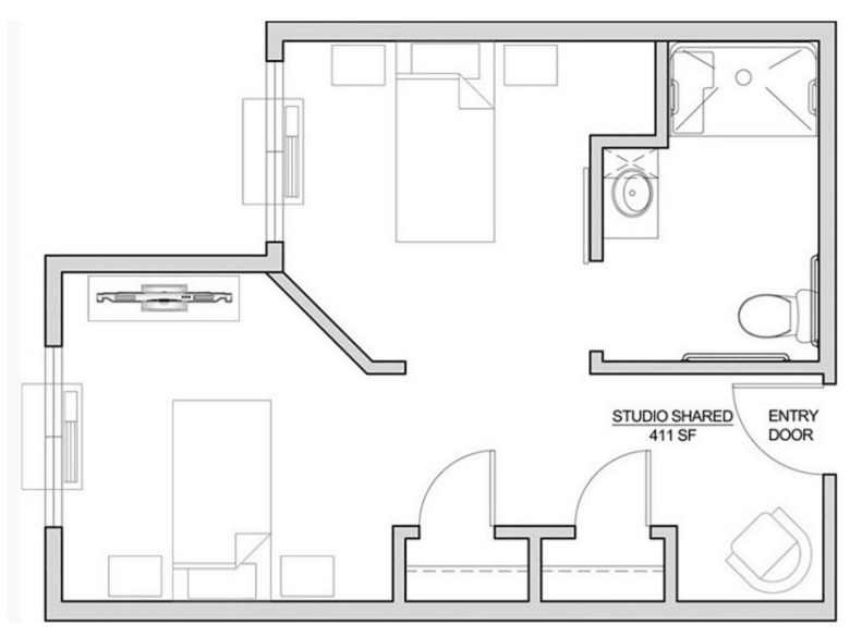 A floor plan layout of a studio apartment featuring a living area, kitchen, and bathroom.