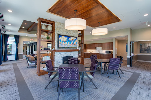 A modern lounge area featuring stylish furniture and a cozy atmosphere.