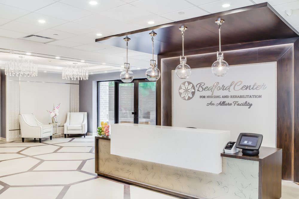A modern and elegantly designed reception area with stylish lighting and comfortable seating.
