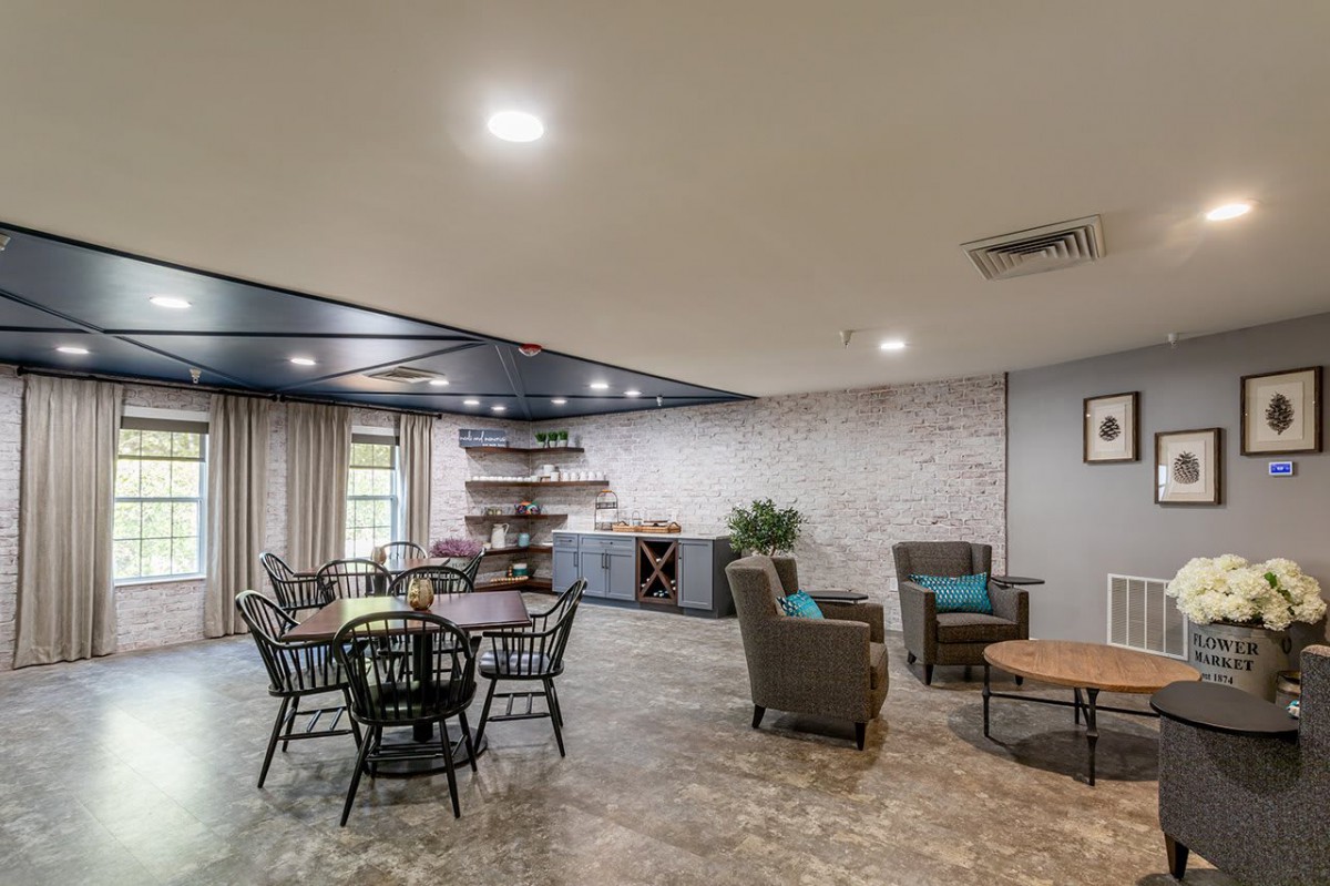 A spacious and comfortable lounge area with seating and decor.