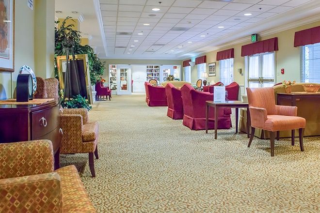 Spacious lobby area with comfortable seating and decor.
