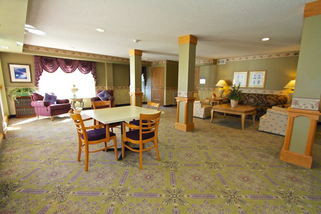 Spacious lobby with comfortable seating and elegant decor.