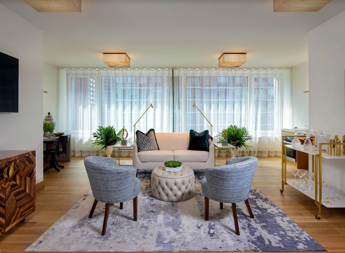 A modern living room with stylish furniture and elegant decor.