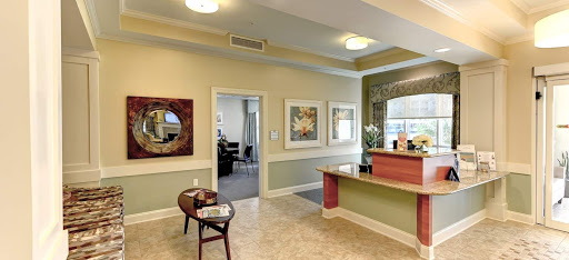A modern office reception area featuring elegant decor and a welcoming atmosphere.