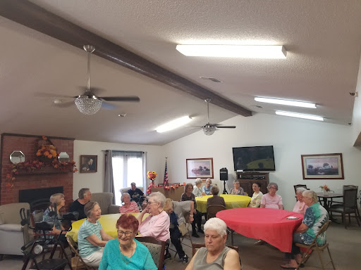 A lively gathering of seniors participating in a community event at a local center.