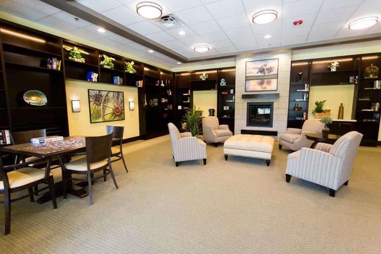 A modern lounge with comfortable seating and stylish decor.