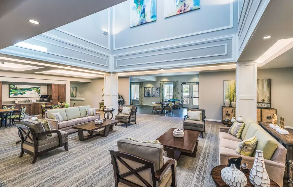 A spacious and modern lobby with comfortable seating arrangements.